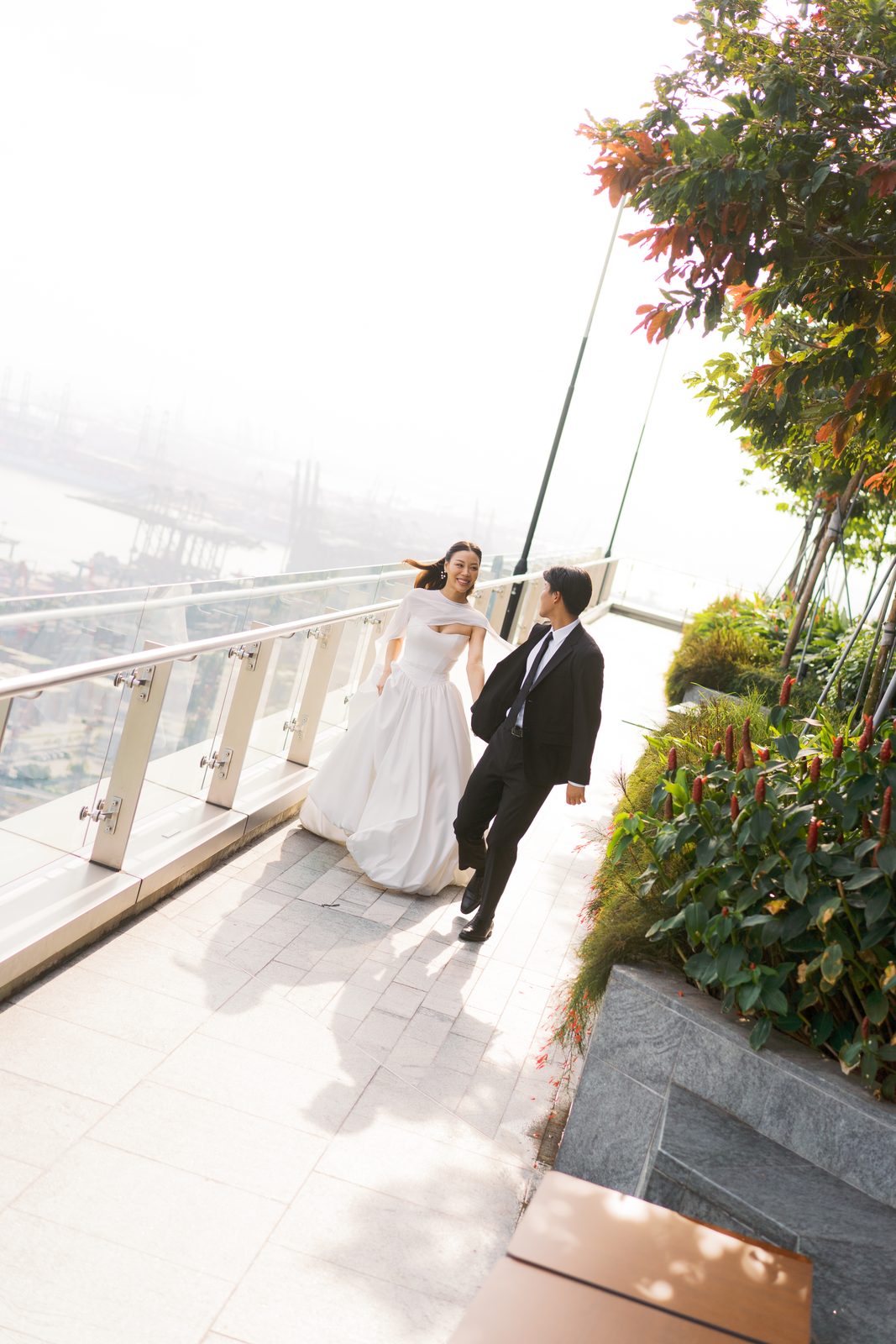 Bride and groom at 1-Alfaro rooftop wedding venue on Level 34 of Labrador Tower Singapore